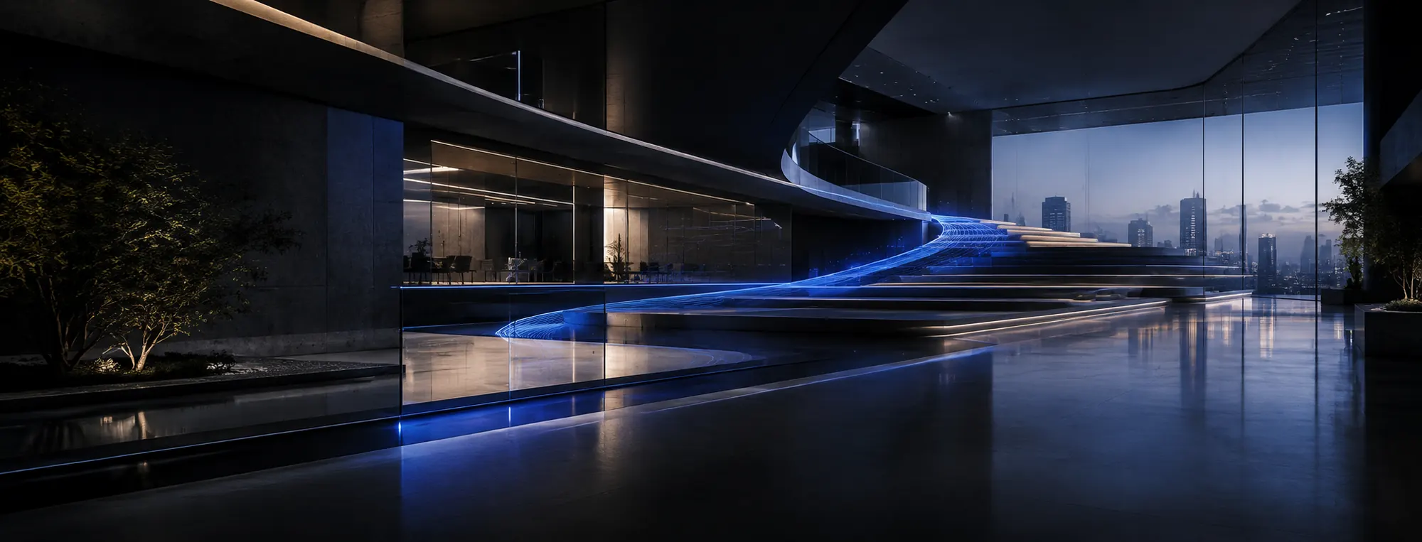 A modern corporate atrium at night with a blue light path rising toward the city